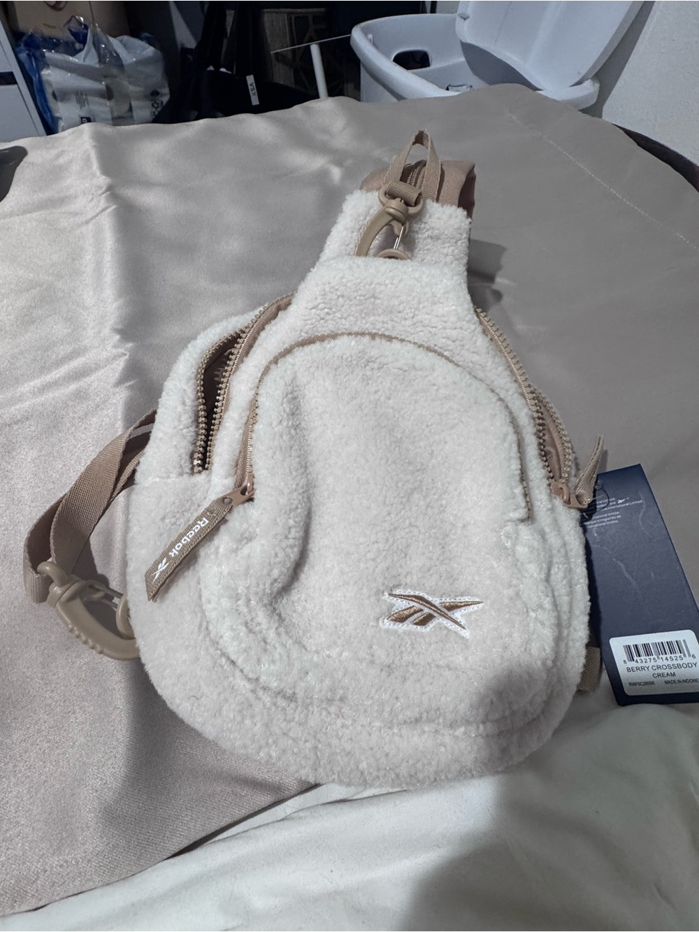 Reebok Cream Sherpa Crossbody Sling Bag with Tan Accents